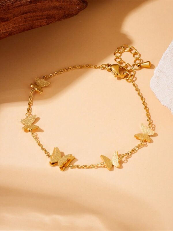 Bracelet papillon doré