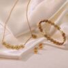 Parure de bijoux en or fleurie