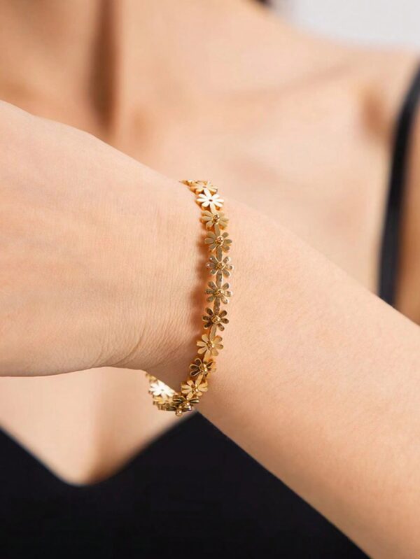 Parure de bijoux en or fleurie